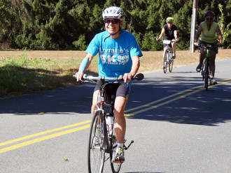 Cyclists ride the 10 Mile route at the 5th Annual Will Bike 4 Food