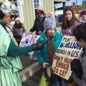 Monte Belmonte interviews students who have accompanied him on the March.